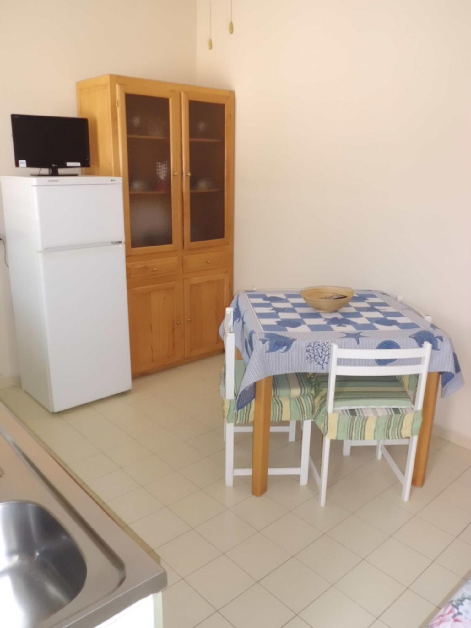 Appartamenti Teulada Di Laura Room photo